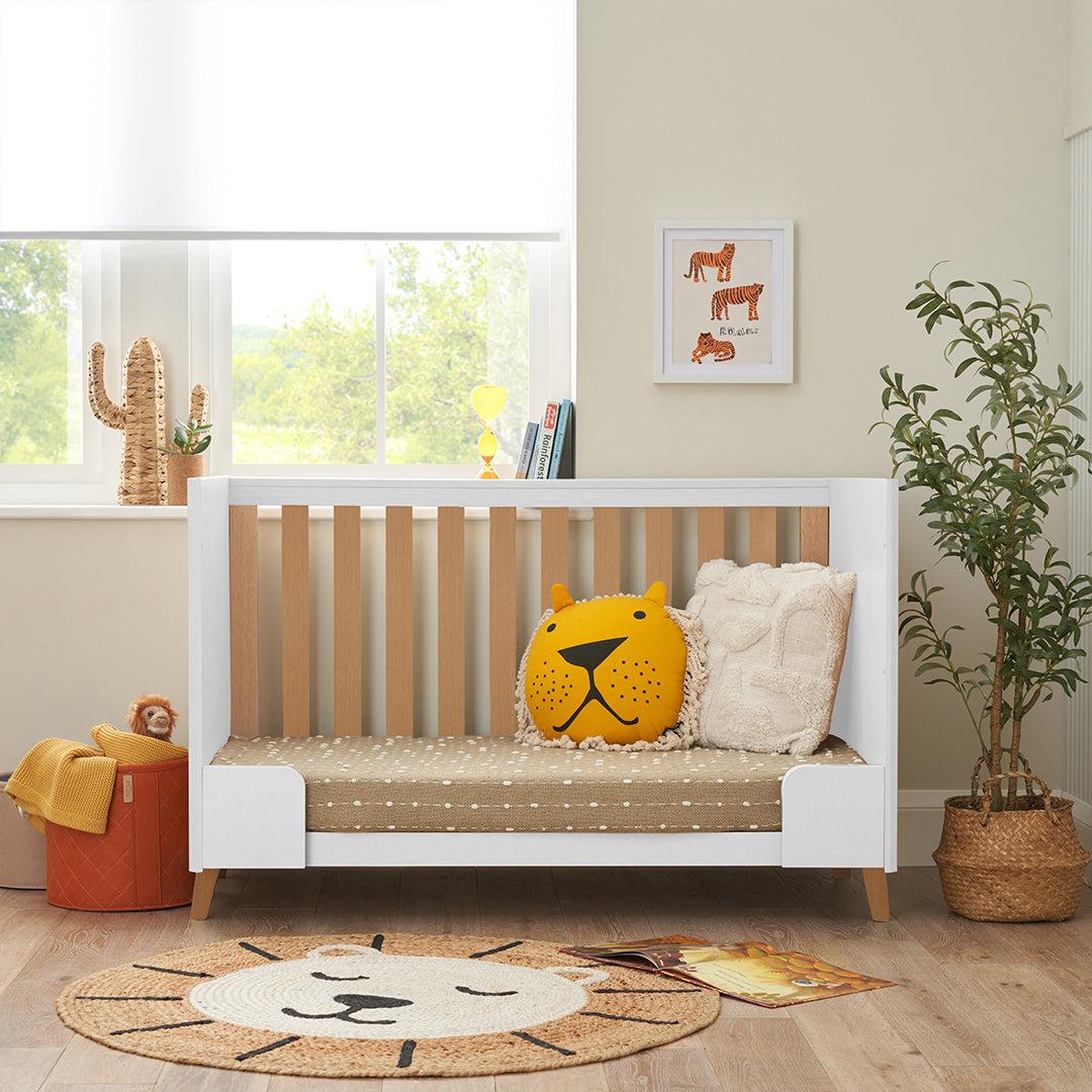 tutti-bambini-fika-mini-cot-bed-white-light-oak-lifestyle-3_a403f93a-2bda-4e10-bb42-7f51912a30bf | Natural Baby Shower